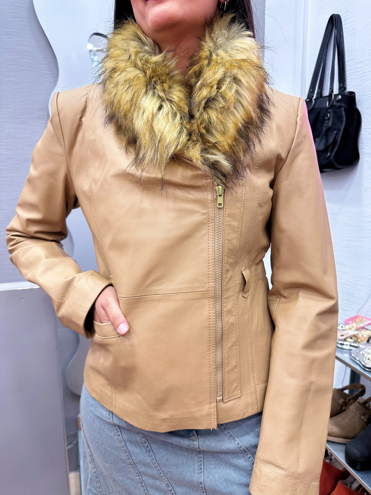 Leather jacket with fur collar