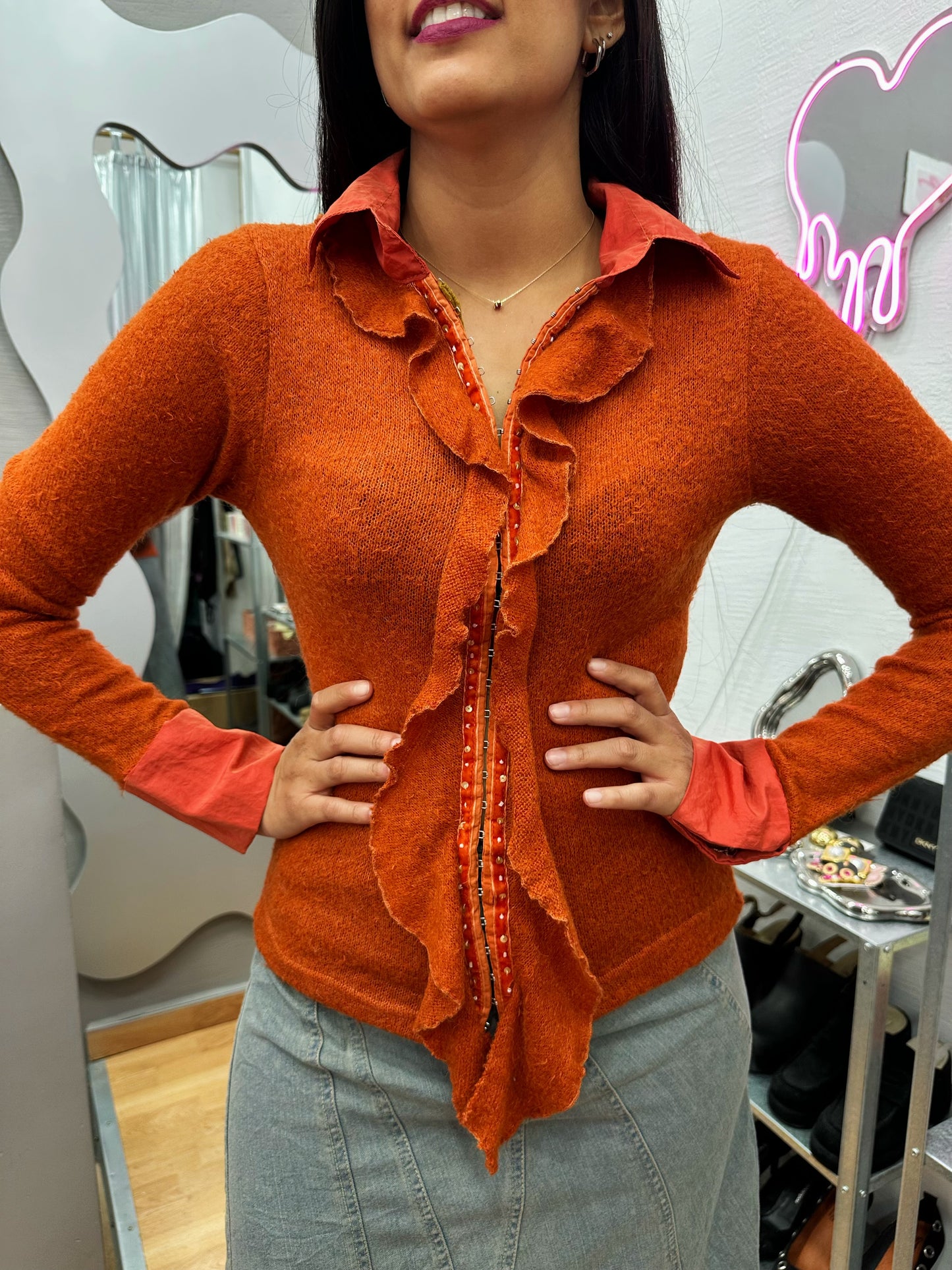 Knitted cardigan with corset pins
