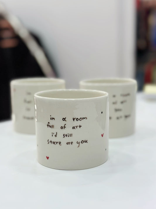 “In a room full of art I’d still stare at you” mug