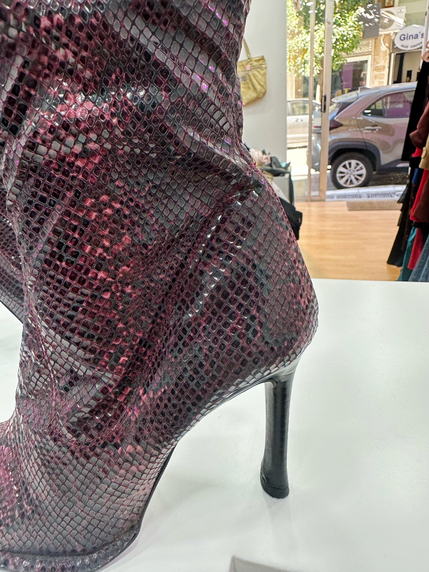 Leather snake print boots