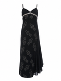 Black asymmetrical dress with silver details and sequins