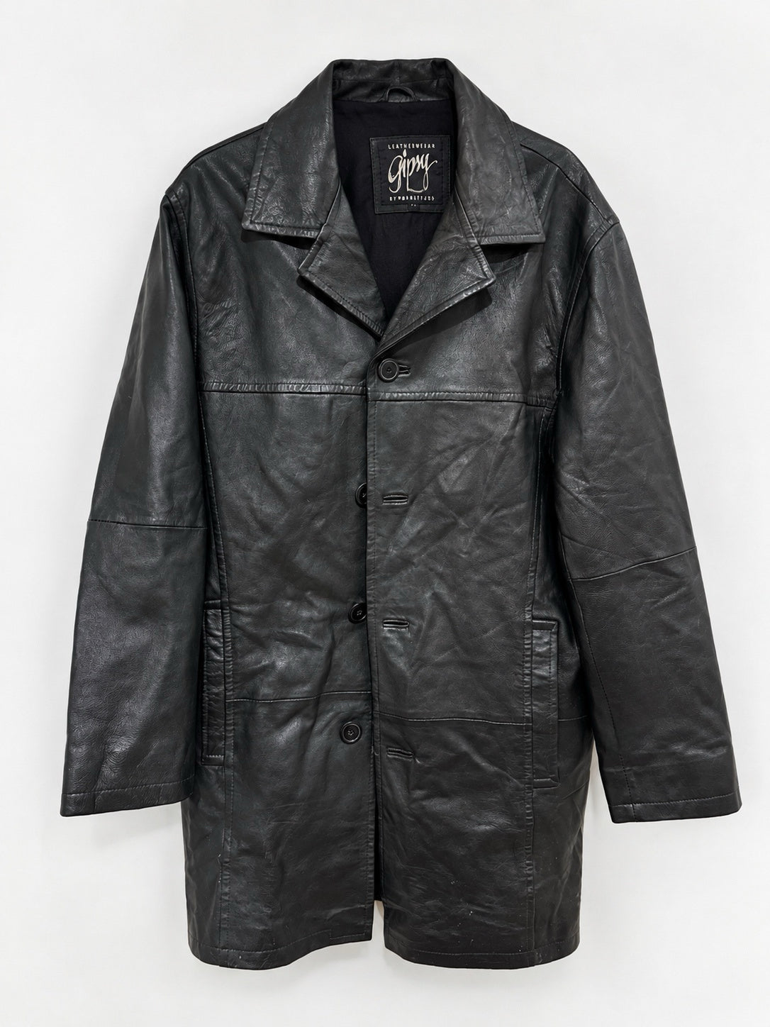 Black buttoned up leather jacket